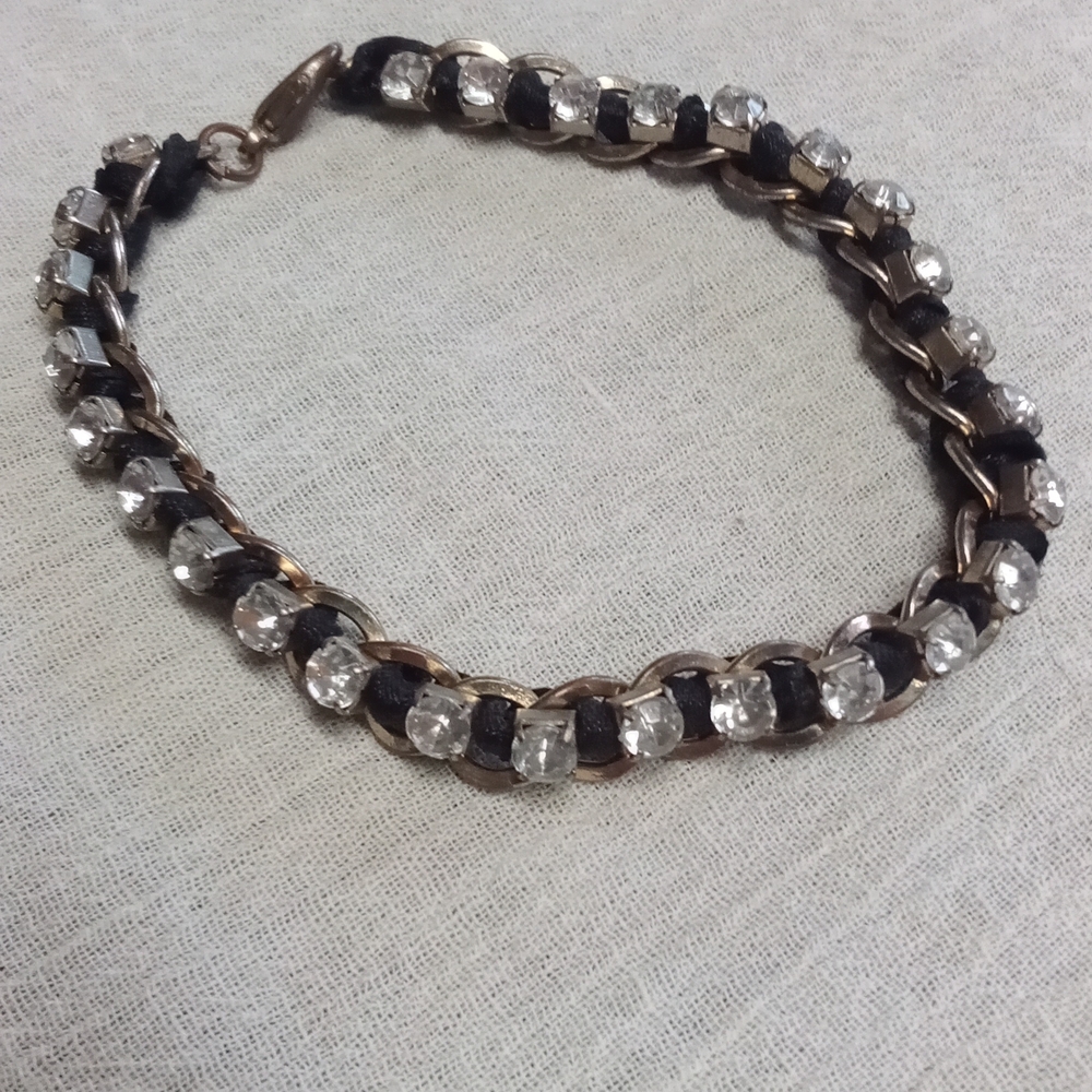 Elegant Gold and Black Leather Bracelet